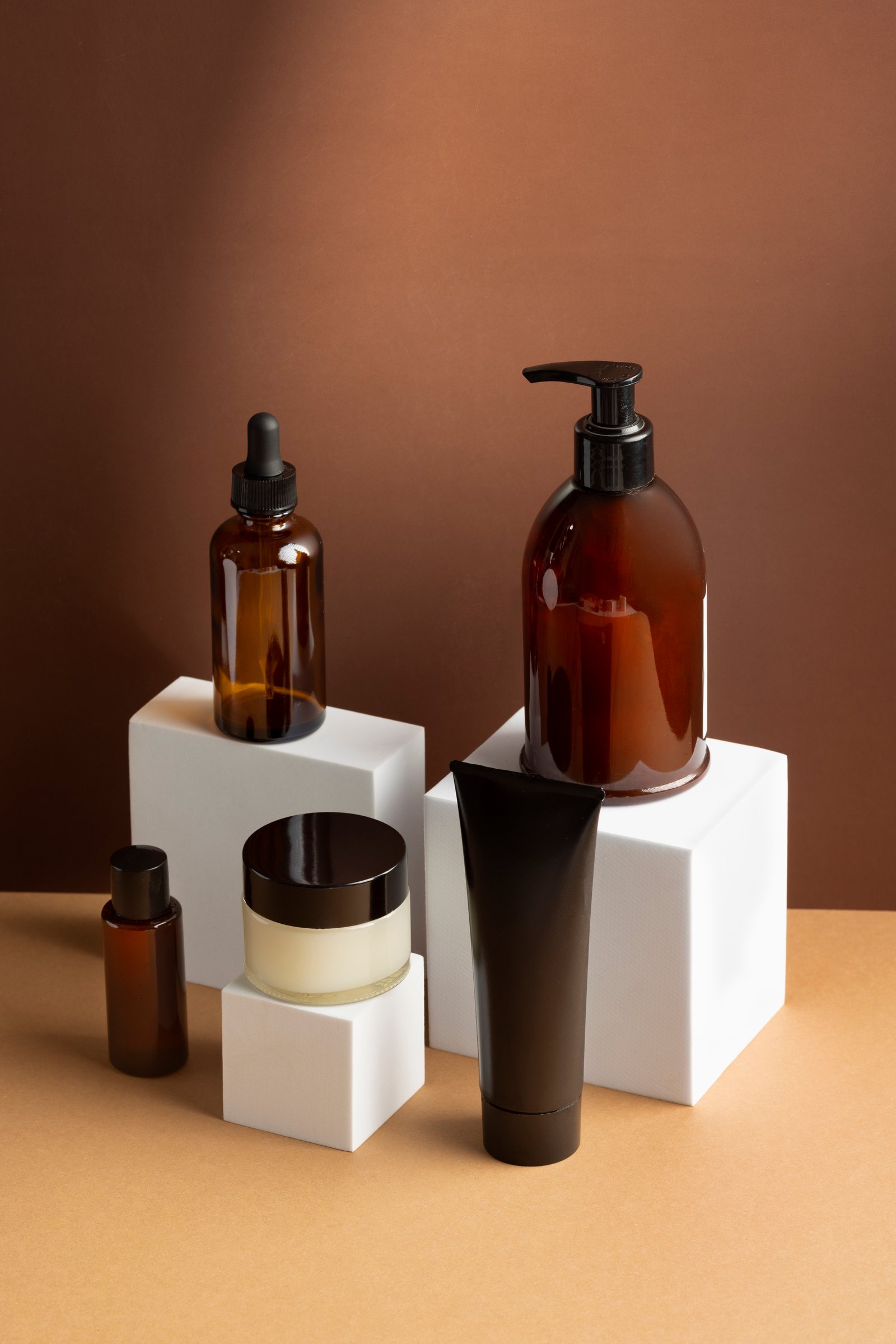 Skincare products arranged on a bathroom shelf